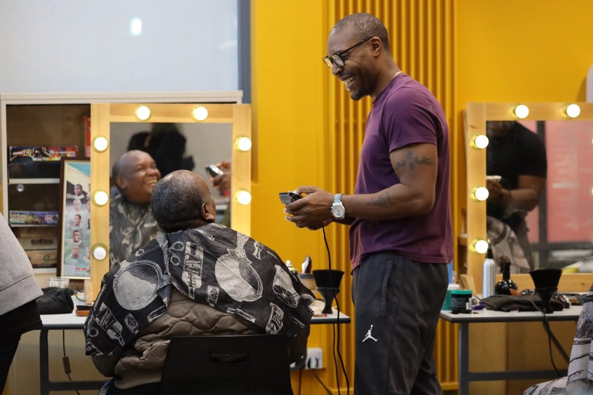 Barber attending to a customer in a barber shop