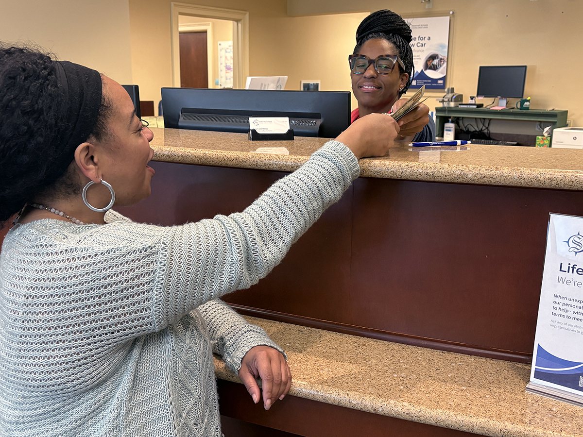 Customer paying a bill at the service counter